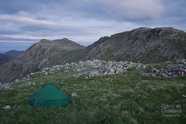 bow fell, ore gap and esk pike from terra nova tent on allen crags in twilight