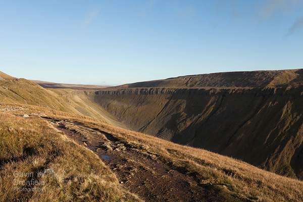 high cup nick at the head of the high cup gill valley on bright winter day from the pennine way path