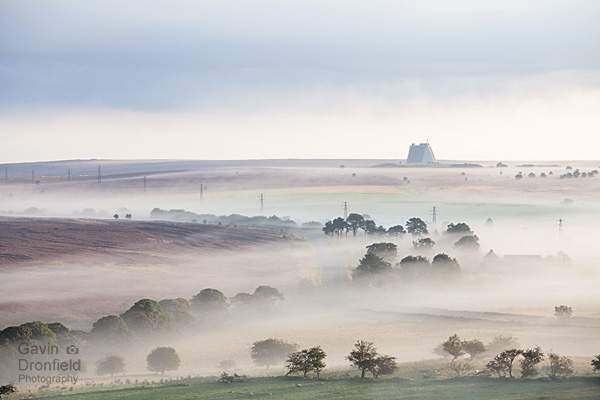 RAF fylingdales on an atmospheric autumnal misty lockton high moor at dawn