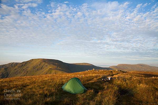 Terra Nova Laser Competition tent pitched on Rampsgill head at bright dawn