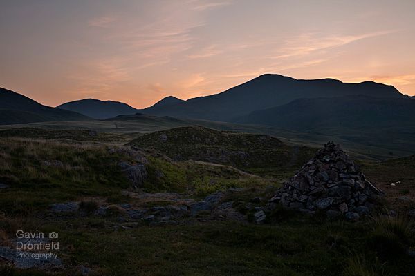 sca fell kirk fell and great gable from cairn on eskdale moor at dawn under pink skies