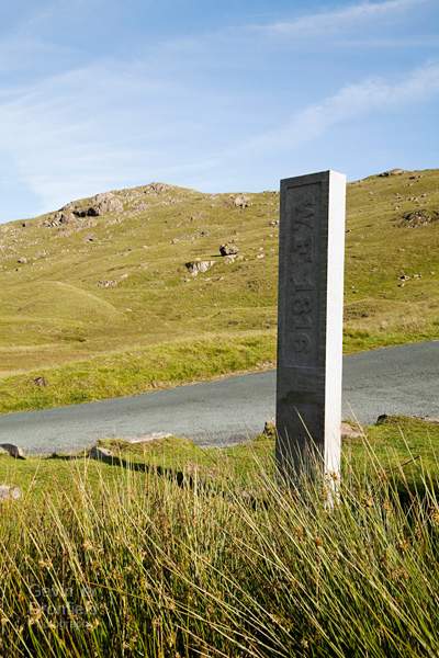 three shire stone at roadside on wrynose pass summit engraved with W.F. 1816