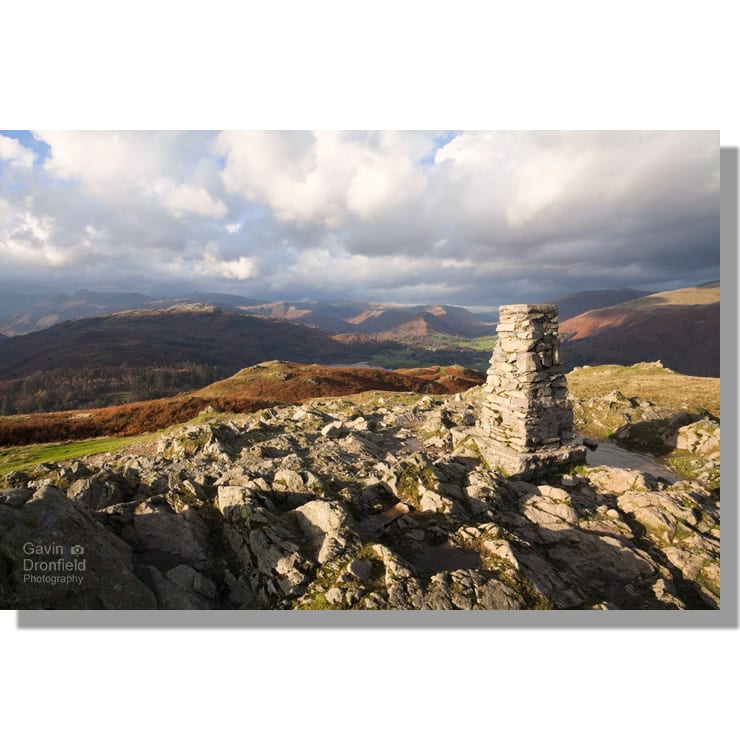 Loughrigg Fell trig point view of Easedale under cloudy skies