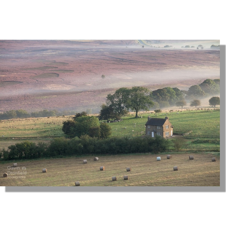 remote Glebe Farm on Saltergate Moor from Gallows Dike during misty dawn