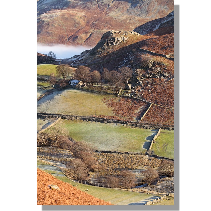 remote cotehow farm in martindale surrounded by frost covered fields under crags of birkie knott